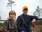 Aenea Vignutti and his Coach take a break while quail hunting.